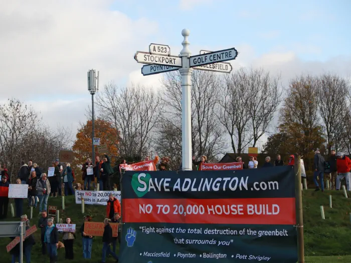 Save Adlington banner on roundabout