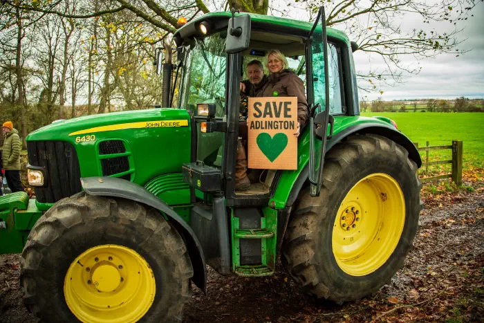 John Deere Tractor with Save Adlington placard