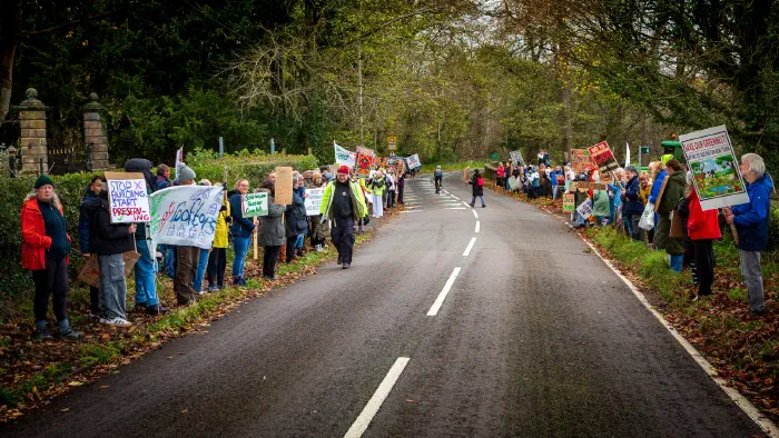 The road outside Adlington Hall lined with 200 protesters on both sides