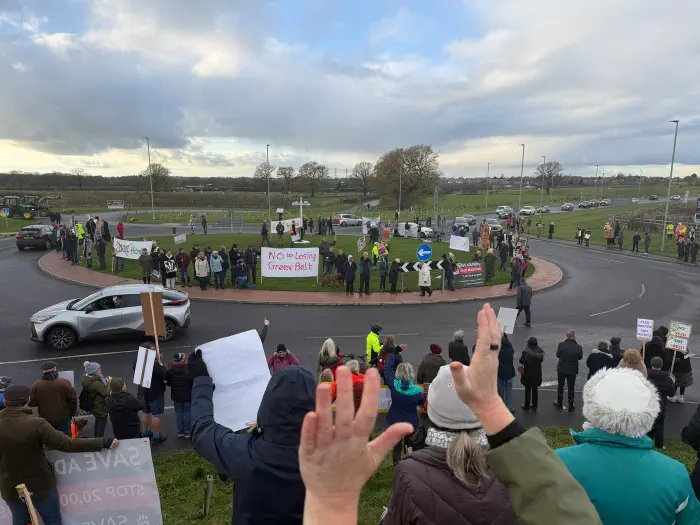 Protesters across the hillside and roundabout