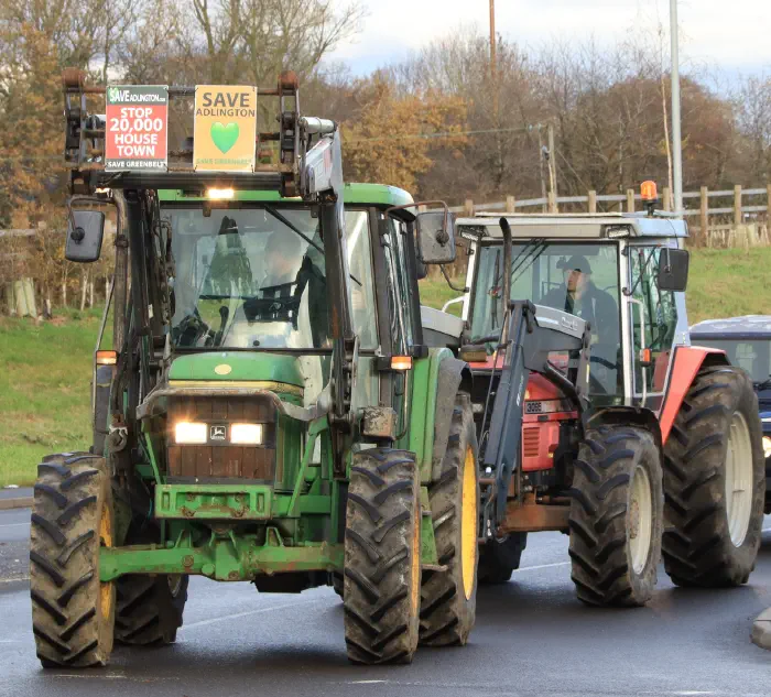 Tractors on roundabout protesting Adlington New Town