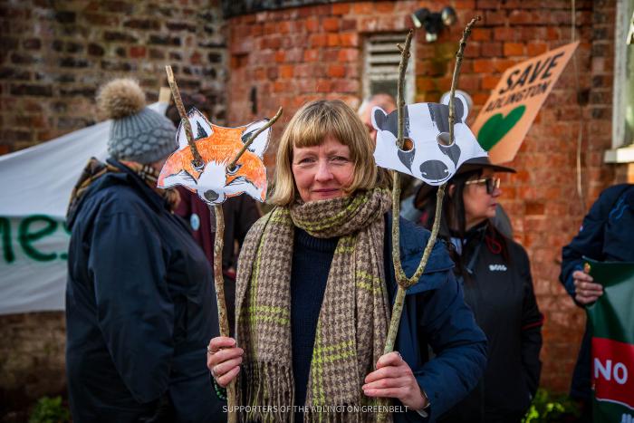 Women with fox and badger masks