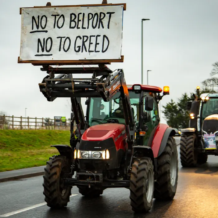 Protesters on side of road holding No to Adlington New Town placards