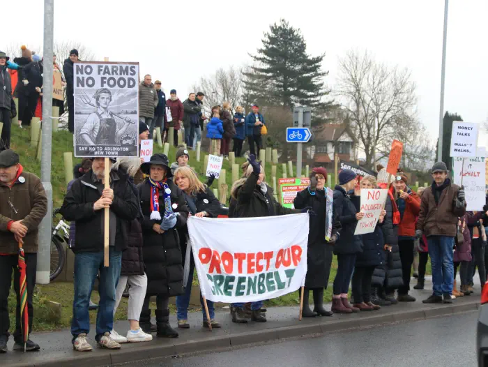 Protesters around roundabout on embankment
