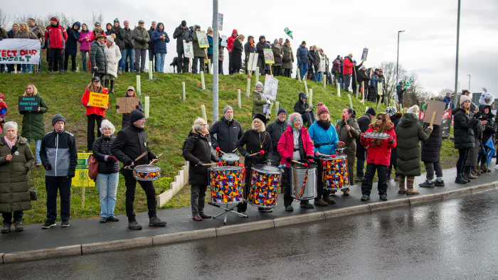 Protesters standing on roundabout